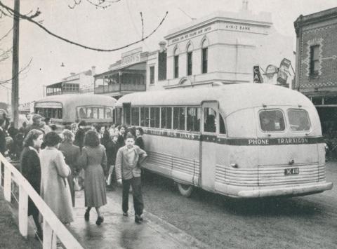 Busy bus terminal, Morwell, 1955