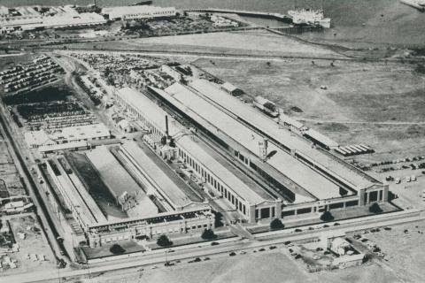 Aerial view of the Ford Company and wharf facilities on Corio Bay, 1955