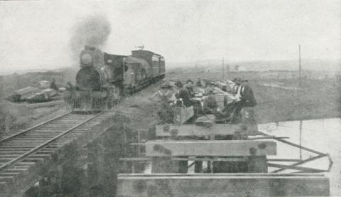 One of the first passenger trains from Noyora passing over the Powlett River temporary bridge, 1927