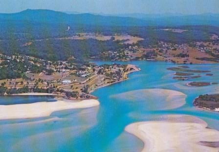 Aerial view of Mallacoota Camp Park and township from Bar