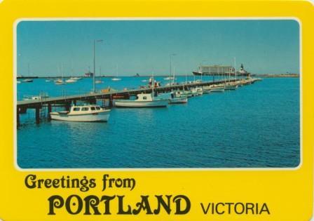 Marina with sheep ship and oil rig at anchorage, Portland