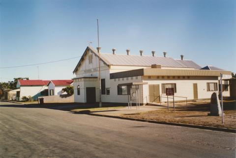 Brim hall (mud brick hall to right 1905-84), 2005