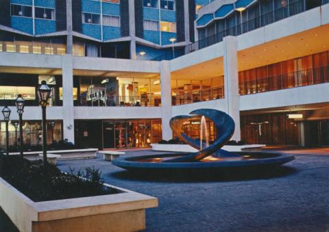 Southern Cross Hotel Plaza and fountain at dusk, Melbourne, 1971