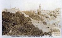 Looking towards St Vincents Hospital and Fire station, East Melbourne, c1920