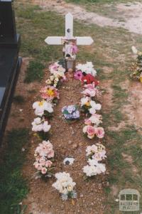 Plot with soccer ball, Yallourn cemetery, 2010