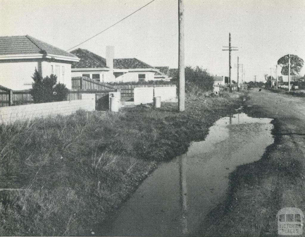 An unsewered area, where street channels are used to dispose of kitchen and laundry wastes, Melbourne, 1955