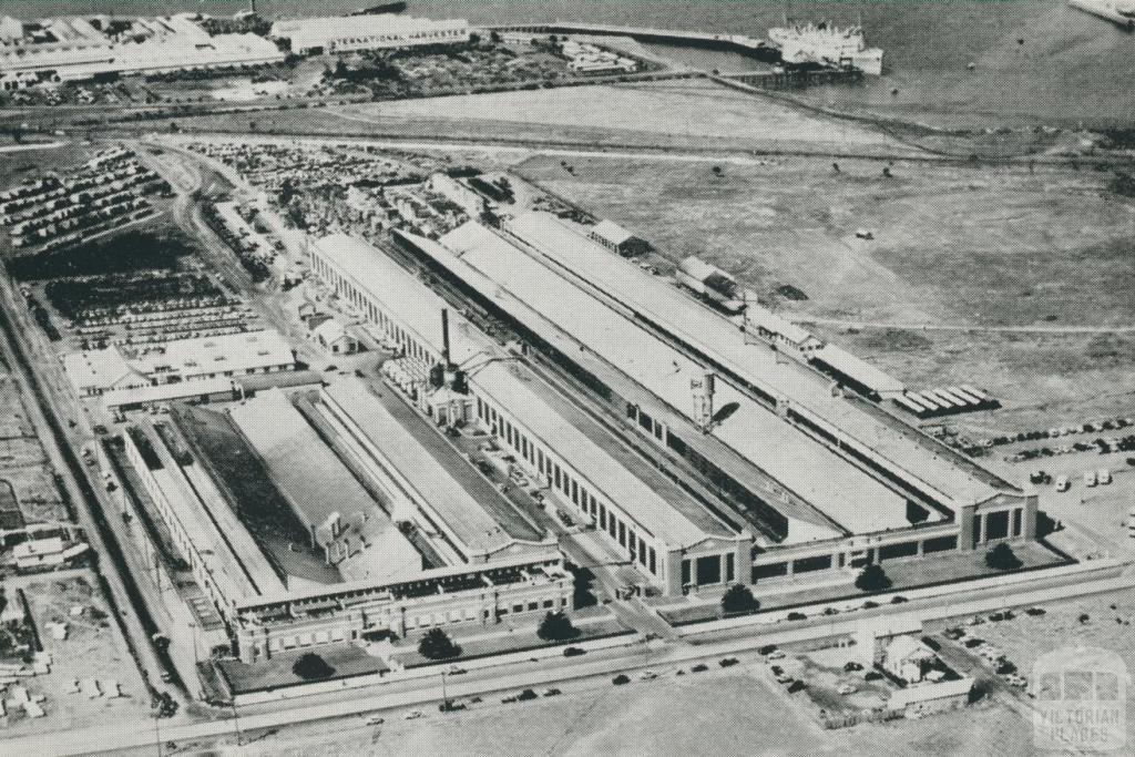 Aerial view of the Ford Company and wharf facilities on Corio Bay, 1955