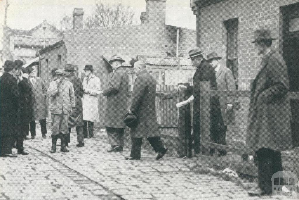 Premier of Victoria A. A. Dunstan visits Melbourne slum areas, 1942