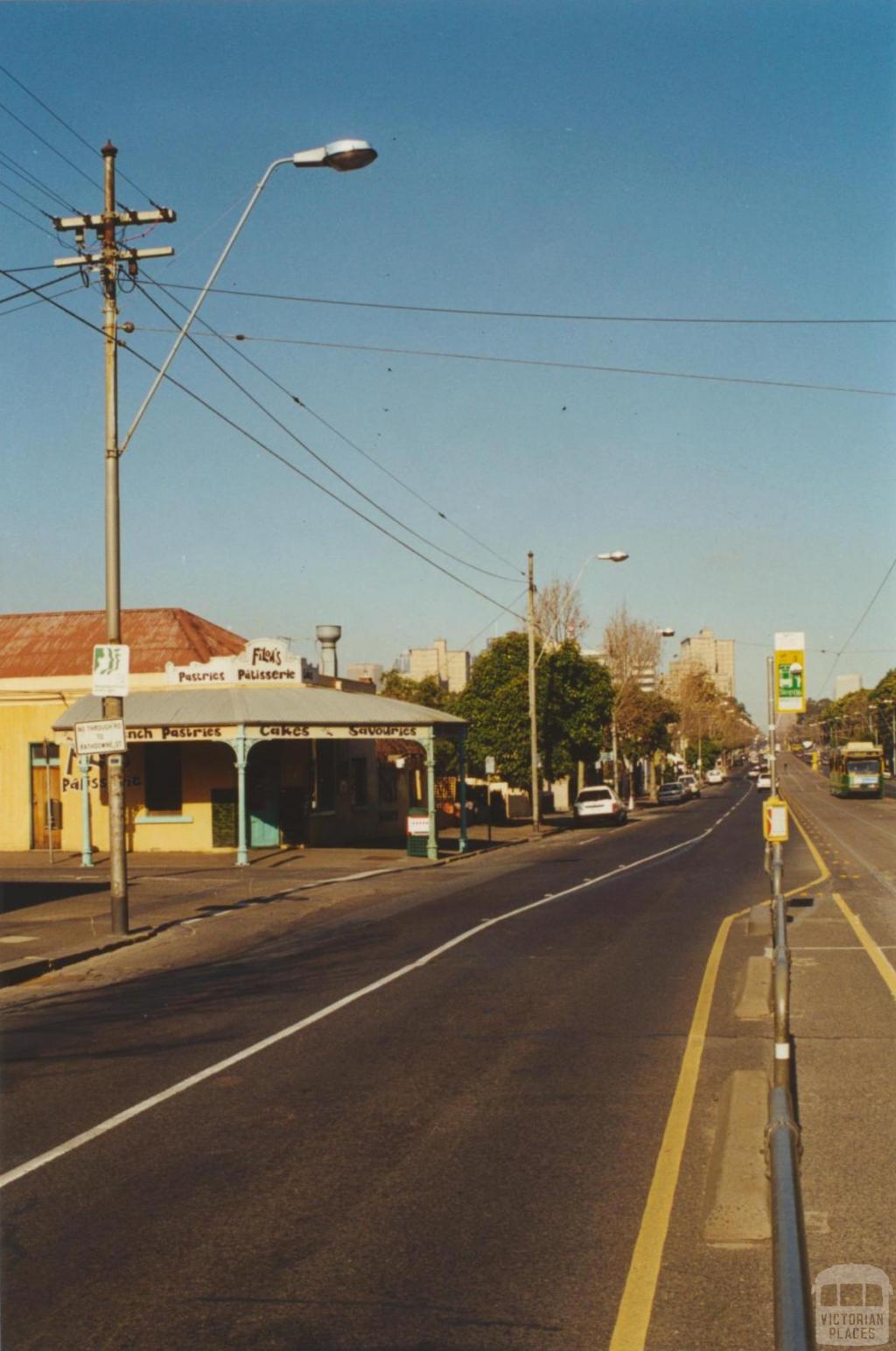 Tram poles with finials, corner of Lygon and Fenwick streets, Carlton, 2000