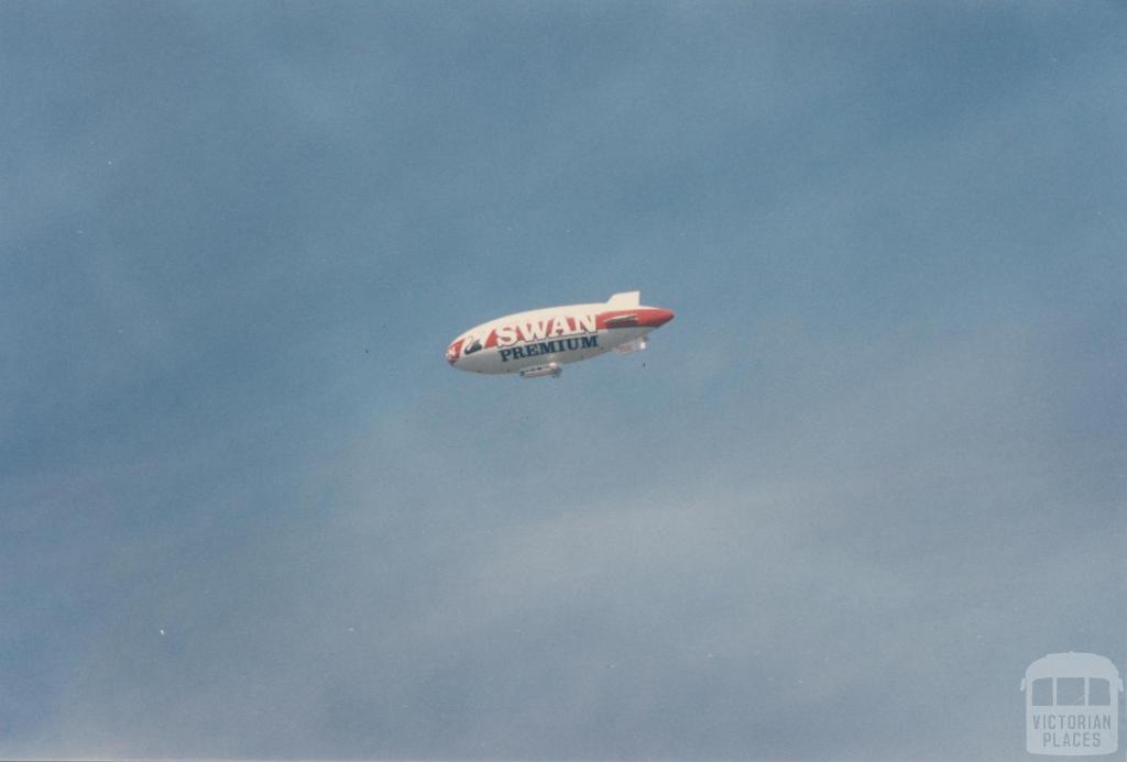 Swan Premium Blimp over Carnegie, 1980