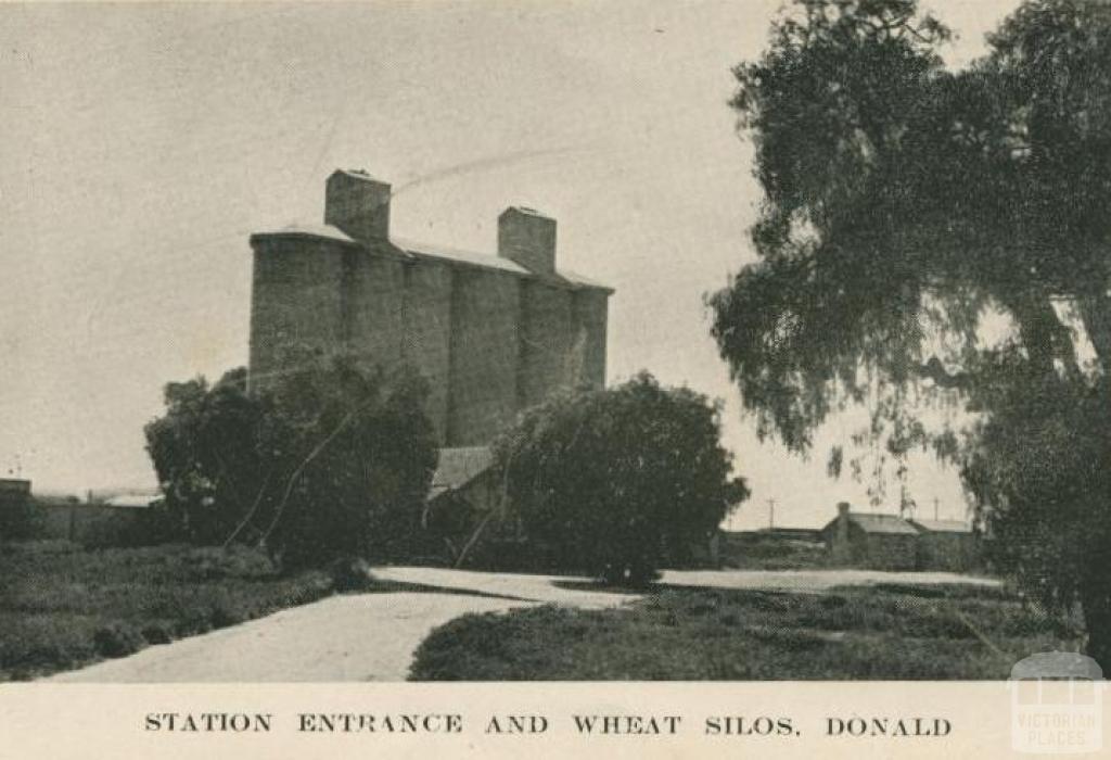 Station entrance and wheat silos, Donald, 1949